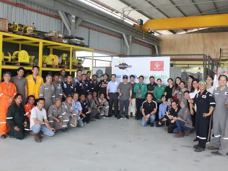 Inaugural HSE day 2019 team photo at Thunder Crane facility with staff in safety uniforms and equipment